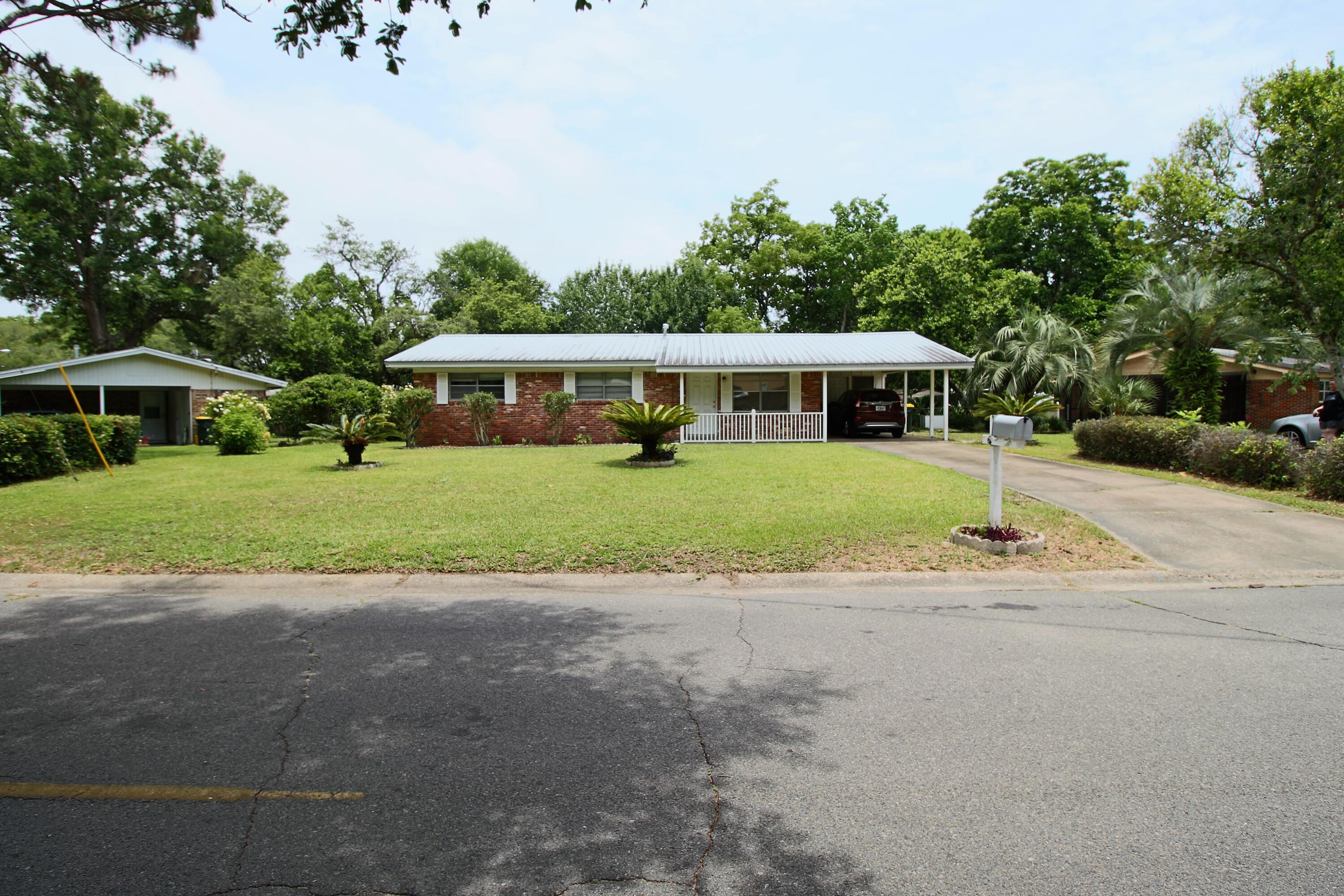 Need a Nice size yard? Come see this 3 bedroom 2 Bath home featuring a Metal Roof, Lawn Pump, Gas Stove, Gas Furnace Unit, Metal detached storage building. Centrally located to shopping, water, military bases.