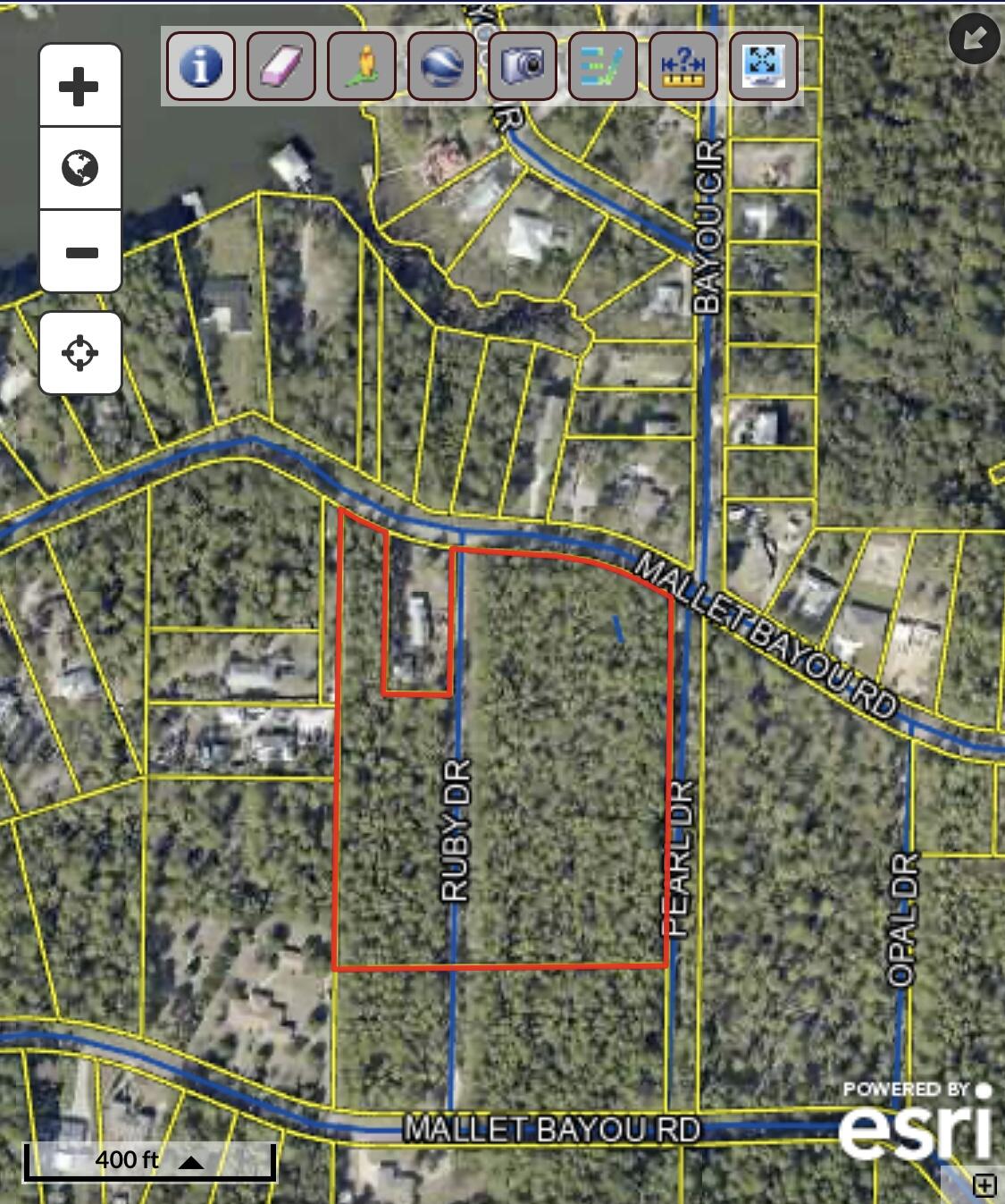 Discover the potential of this mostly flat, wooded, and dry 6.904-acres, zoned Rural Village with the capacity for 2 units per acre.  Situated in a growing area of bayou front homes.Whether you're looking to develop a community or build a serene country escape, this property offers endless possibilities. Imagine creating an estate surrounded by nature, yet conveniently close to the vibrant heart of Freeport. Experience the charm of small-town living within an  easy drive to the stunning beaches of the Emerald Coast. Whether you envision a cozy retreat, a spacious family haven, or a new community, this lot provides the perfect canvas for your dreams.  *Buyer to confirm all details*