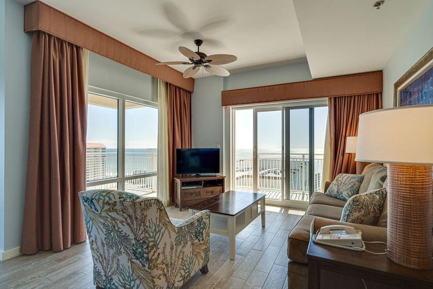 The easterly views go on and on from this 16th floor southeast facing 'A' rated lock-off. This condo features wood plank tile flooring throughout and updated furnishings. The lock off configuration gives options for use and rental as a 2 bedroom 2 bath or a 1 bedroom one bath and a studio. The one bedroom side features a full kitchen, large living and dining areas and a bedroom offering a king size bed and en suite bathroom. The studio has two queen beds so nobody has to sleep on the traditionally uncomfortable sleeper sofa. Luau offers exceptional amenities for you and your guests to enjoy; such as a lagoon style pool with a swim-under waterfall and hot tub, a fitness center, outdoor gas grills, and easy beach access.