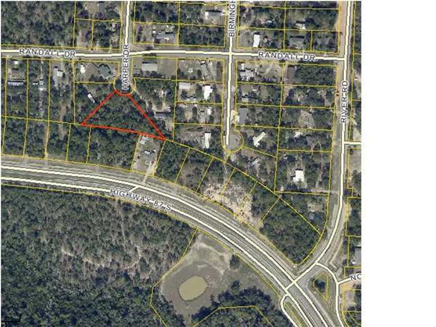 Vacant lot located on a cul-de-sac.The lot is zoned for mixed residential use.