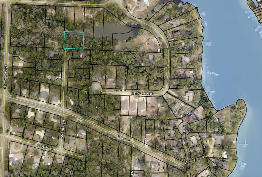 Just under a  half acre on a wet weather pond, located in the center of Niceville. This lot is located on a dead end street with very little traffic. Come design your dream home with a walk out basement and plenty of room for a spacious back yard. This lot will currently require PBTS septic system to be installed. Seller has a survey on file and a wetlands delineation survey.