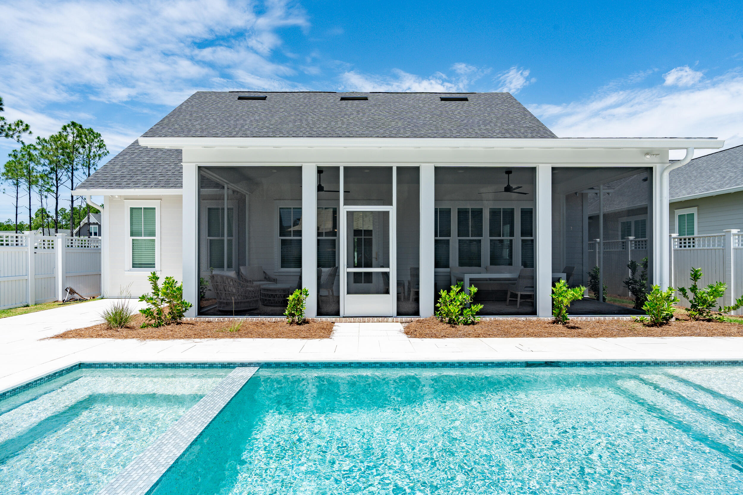 FULLY FURNISHED!!! Ficus plan built by Huff Homes. This home is currently our model home in the Pines phase of the Watersound Origins community. This single-level, beautiful new home with 4 bedrooms, 3.5 bathrooms, and a 2-car front load garage comes with all the upgrades including a large screened- in rear porch overlooking the private pool and spa, and is situated on a corner lot next to common area.This stunning Ficus model includes all furnishings and window treatments meticulously chosen by a known professional interior designer that complement the flow and finishes throughout. This well-designed plan offers luxury interior features including: 10' ceilings, crown molding throughout the main living area, 8' solid core raised panel doors, Medallion wood  flooring throughout, Quartz C countertops throughout, wood cabinets with easy glide drawers throughout, along with stacked glass cabinets in kitchen, an upgraded stainless steel Wolfe appliance package (includes Sub-Zero refrigerator, dual-fuel 36" range, Best 36" chimney vent hood, Asko dishwasher and a 24" Sharp microwave drawer), under cabinet lighting, lap and gap accents from entry hallway to kitchen at 45", living room walls from floor to ceiling and one full wall in the master bedroom. Plus, built-in cabinets in the laundry room above washer and dryer, plus more. Exterior features include gas line and lantern on front porch, gas stub for grill with poured cement pad, plus a private pool and spa surrounded by pavers and a 6 ft privacy fence! New construction Huff homes in The Pines are built to the highest quality standards with attention to detail in all finishes.

The Watersound Origins community is one of South Walton's most coveted neighborhoods for its exceptional amenities, beautiful new homes, and prime location. Amenities include the Village Commons pool & fitness center, sports courts including tennis and pickle ball, miles of nature trails, dock access to Lake Powell, unlimited golf, and lots of green space for outdoor play. The all new Watersound Town Center brings a new level of excitement and convenience to the community with a Publix Super Market, delicious restaurants, healthcare facilities, and more right at the entrance to the neighborhood! 

*Pricing for inventory homes include lot premiums and may include optional upgrades. Added options/upgrades and pricing are subject to change. Please check with the on-site community specialists for the latest information for this home.