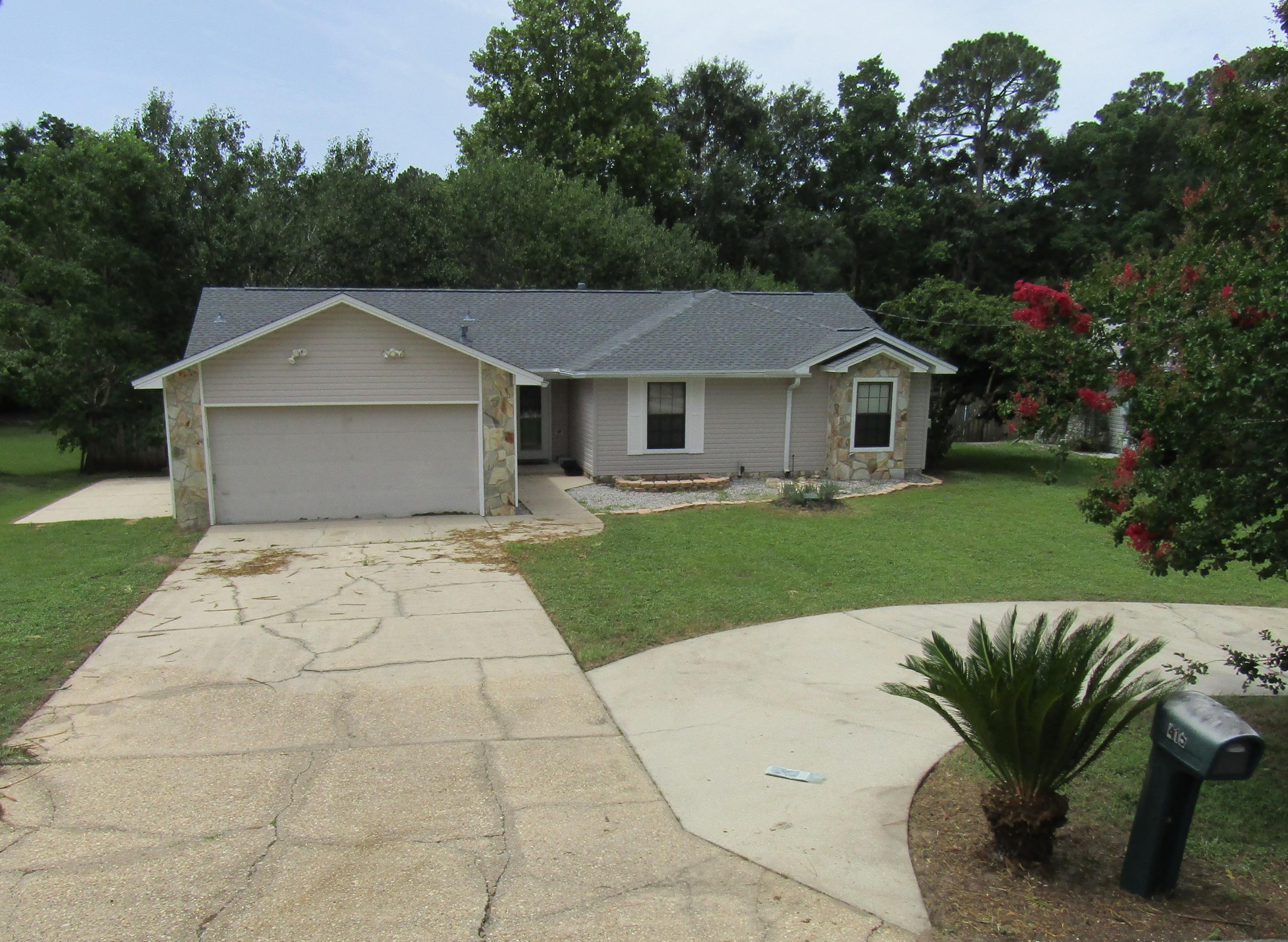 Pool home at the end of a quiet street in the heart of Niceville. Featuring tile throughout the main living areas and beautiful laminate flooring in the bedrooms. The open concept layout offers an over sized living room with fireplace, huge bedrooms, and a nice sized kitchen with a dining area over looking the back yard oasis. The back yard is an entertainers delight with an enormous deck leading to a large pool. It doesn't end there though, the spacious back yard is lined by a privacy fence and offers a large storage building (offered AS IS). The home also offers ample parking with a circular driveway and additional parking pad for a boat or RV. BRAND NEW ROOF INSTALLED JUNE OF 2019.