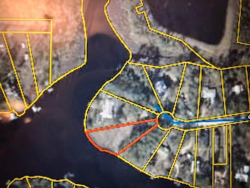 Great price reduction on this beautiful and serene homesite located on Mallet Bayou with incredible views AND 167 FEET OF BAYOU FRONT.  Build your dream home and private dock on one of the very last Bayou front homesites still available.  Situated  just off Hwy 331 and south of Hwy 20, this lot is convenient to South Walton with easy access to I-10.  NO HOA DUES affiliated with this property.  This a RARE find.