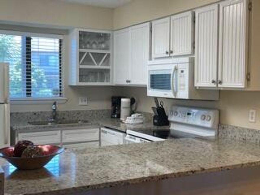 Don't miss out on this updated vacation rental in Portside!  This unit performs well as a vacation rental for an investment, and would also make a nice primary residence.  A great location close to our sugar white sand beaches and pier park.  The most recent upgrades include new flooring, carpet, and granite countertops.  A complete list can be found in the documents section.