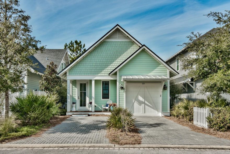 Welcome to your perfect 30a beach home! Located in the private gated community of Watersound West Beach, you will enjoy beach access to one of 30a's premier secluded beaches through Deer Lake State Park. This lovely cottage is the perfect family retreat with a spacious open great room, kitchen, and dining area that leads to a screened porch featuring a custom porch swing and outdoor dining. The master suite is conveniently located on the first floor as well as a powder room and laundry with front loading washer and dryer. Upstairs, there is a loft area which is a perfect kids retreat and doubles for a sleeping area with a daybed/trundle. Off the loft area are two more bedrooms--one with a king bed and one with a twin over full bunk bed. This beautiful home is being offered fully furnished and rental ready and features gorgeous hardwood floors, granite counters, stainless appliances,  and custom touches throughout.  There is also a single car garage!  Watersound West Beach features a community pool/clubhouse, boardwalks, two parks, boardwalk to the beach, and fitness center at Watersound Beach. Enjoy the beach life!!!