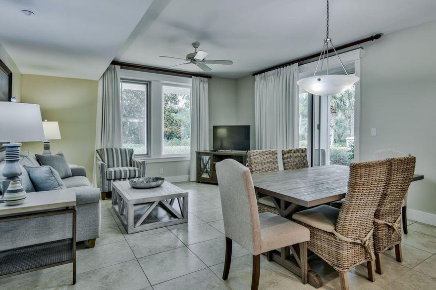 Welcome to the most convenient location in the Grand Complex of the Village of Baytowne Wharf. This ground floor two bedroom Lasata is located just across from the Conference center, fitness center and the Ballyhoo Bar. This makes it easy for you to jump in the action of all that is going on in the Village and easy to come back to the quiet area where the gardens and tropical pool are located.This two bedroom two bath was configured as a lock-off to maximize rentals-- rent it as a 2 bedroom or separate into a full sized one bedroom plus a studio or choose to use it all for yourself. It has been fully refreshed with coastal decor and features tile throughout for easy maintenance.