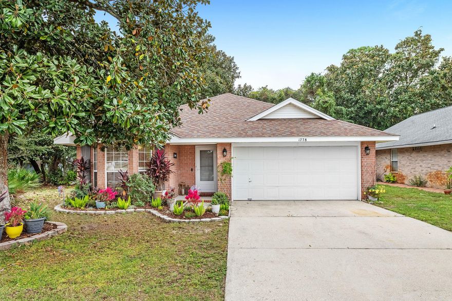 Newer Roof | Deeded Bay Access. Located in Navarre's sought after Ivalea Gardens, this home features a 2020 roof, 2025 installed HVAC, split floor plan, vaulted ceilings, and a spacious 2 car garage. The primary suite offers dual sinks, a soaking tub, and a walk-in closet for comfort and privacy.Enjoy a fully fenced backyard with composite decking, surrounded by mature trees.Just 12 miles to Hurlburt Field, 3 miles to Publix, and a short walk to the Sound with deeded bay access, this location balances convenience and coastal charm.