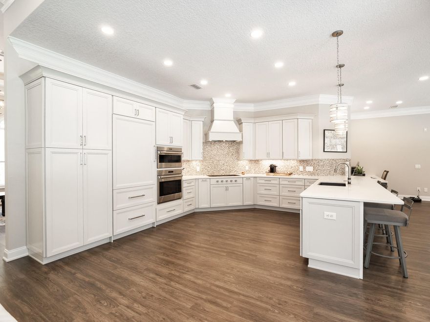 **SHOWINGS WILL START ON TUESDAY, 7/5/22 @ 10AM**New Roof Installation Prior to Closing**Have you ever walked inside of a home to be stopped in your tracks or become speechless because you are in complete Awe of its beauty? What a treat to be able to check this one of kind masterpiece out. This home was completely overhauled in 2018. From the moment you enter you are greeted with high ceilings, beautiful floors, large picturesque windows to maximize all of the natural light, and views of your Backyard Oasis. There is an entire Home Generator for unexpected weather. Under the roof there are 4BR/3.5BA, a formal living room, formal dining room, an exquisite gourmet kitchen with Wolf Subzero & Miele Appliances. A gas range and large breakfast bar, built-in pantry and hidden fridge compartment,