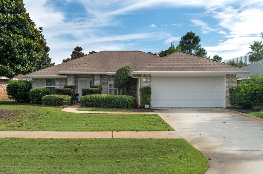 $10,000 Price Adjustment!This immaculate & spacious all brick home features a split floor plan with three bedrooms and two baths. Vaulted ceilings, gas fireplace, tall windows and hardwood flooring are just a few of the features of this beautiful well cared for home located in the family friendly neighborhood of Indian Lake. Walk or bike to the beaches at Henderson State Park, this home is convenient to all of the outstanding amenities of Destin, FL. The master retreat features a tray ceiling, hardwood floors and a master bath with double vanity, oversize tub, private water closet and a large walk in closet.The dining, living, breakfast nook and kitchen are all open which makes this home perfect for entertaining.