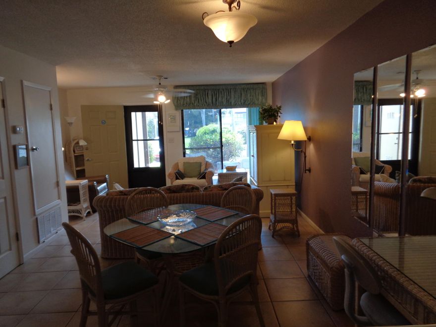 Vacant, non-rental, easy show. No need to wait on confirmation from a renter, VACANT, GO SHOW AND BRING A GREAT OFFER. Lowest priced Portside condo, immaculately furnished. This condo has very unique features not offered at other Portside condos easy to maintain ceramic floor tiling, and fully equipped kitchen with top of the line appliances. This condo is being offered fully furnished and has never been rented out. The second floor of this condo is carpeted and the master bedroom has sliding glass doors leading out to a large balcony overlooking the tennis courts. Buyers will be amazed at how well kept this condo is with a new water heater and AC unit less than three years old. This condo can be converted to a rental if desired. Dimensions are approximate.