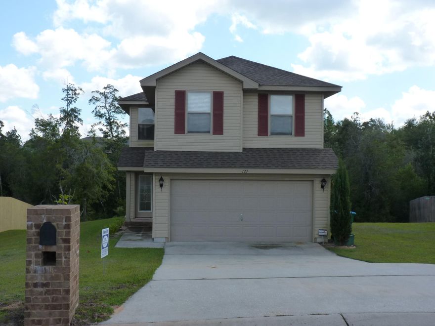 WONDERFUL LIKE NEW and MOVE IN READY. This is a perfect starter home or rental property investment. As you enter you will be welcomed by neutral colors and two story ceilings in living area. Granite counter tops through out and stainless steel appliances give you the luxury your looking for. The main floor is open and has a half bath for your guests. the upstairs has a split floor plan for privacy. The master boast a walk in closet and large master bath with double vanities. There is plenty of storage in this home. Outside you can enjoy the deck overlooking the natural green space with plenty of yard space. Don't miss out on this lovely home in a popular neighborhood convenient to all shopping. Buyer to verify schools and dimensions. Call today for your appointment.