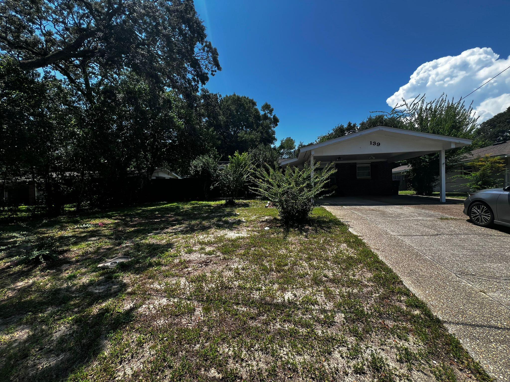 Welcome to 139 Robinwood Dr NW, a solid 4 bed, 2 bath home with approx. 2,400 sq ft of living space on a 0.206-acre lot. Originally a 3/1, this home now features an added bedroom and bathroom, offering flexible space for your family or guests. Built on a sturdy slab, with a 6-year-old shingle roof and newer furnace and HVAC (both ~2 years old). Inside you'll find a mix of carpet, tile, wood, and vinyl flooring, paneled and sheetrocked walls, and original white kitchen cabinets and countertops. Public water/sewer, Gulf Power electric,