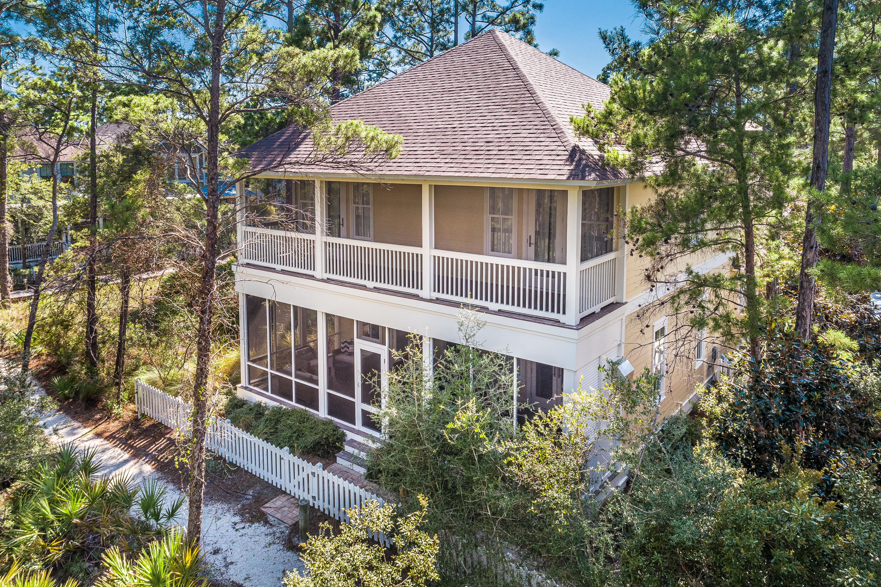 Welcome to your 30a beach home overlooking Deer Lake State Park! Located in the private gated community of Watersound West Beach, you will enjoy beach access to one of 30a's premier secluded beaches. This beautiful home features 2 HUGE porches overlooking the wooded park, and the pool and beach access are just steps away from the back door. The layout of this home is perfect for entertaining family and friends--spacious master suite on the first floor and 3 bedrooms with ensuite baths plus a den on the second floor. The great room is open to the well appointed kitchen and features a gas fireplace and french doors to the large screened porch with built-in gas grill. A spacious master suite boasts french doors to the screened porch and features a coffered ceiling and 2 walk-in closets.