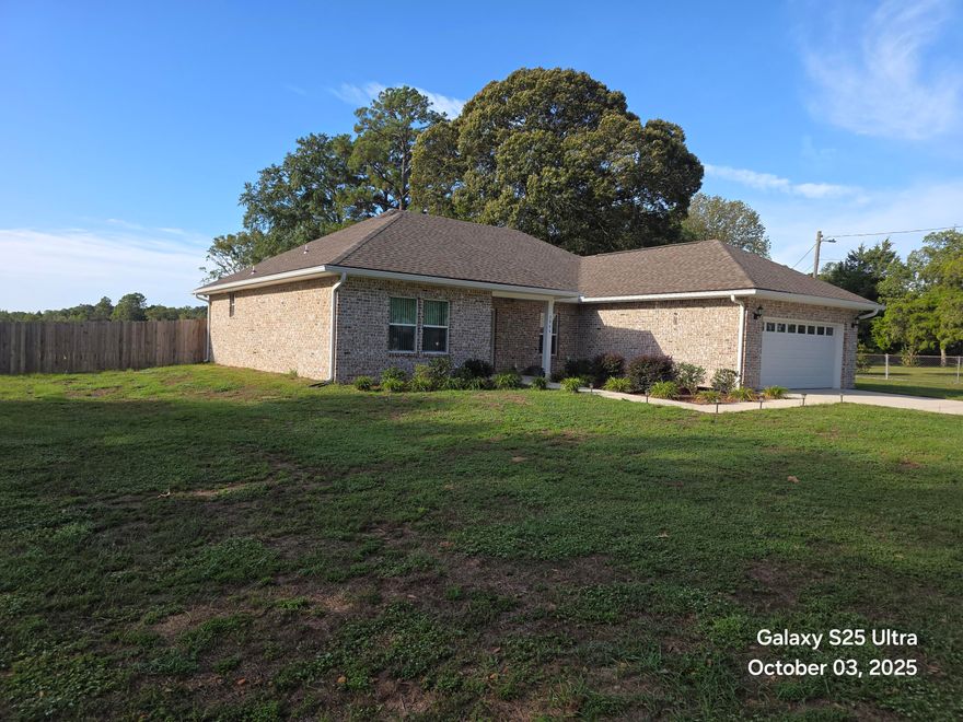 Welcome to 2944 Barton Rd--a beautifully custom-built all-brick home located on a desirable corner lot in the heart of Crestview. Built in 2022, this immaculate residence offers the perfect blend of style, comfort, and modern convenience.Step inside to discover 1,877 square feet of thoughtfully designed living space, featuring 3 spacious bedrooms, 2.5 baths, and elegant finishes throughout. The inviting living room boasts a lighted trey ceiling, creating an elevated ambiance perfect for relaxing or entertaining.The open-concept kitchen is a chef's dream, complete with quartz countertops, soft-close cabinetry, and stainless-steel appliances--still under warranty for one more year! A large laundry room with utility sink adds everyday convenience. while the 2-car garage offers plenty of storage.

The primary suite is a true retreat, showcasing a large walk-in closet, spacious vanity, walk-in shower, and separate water closet for added privacy.

Additional features include:
 * Fully fenced backyard with privacy fencing
 * Enclosed screened-in back porch - perfect for morning coffee or evening unwinding
 * Underground utilities for a cleaner aesthetic and added reliability
 * Irrigation system to keep your lawn lush year-round
 * Dimensional shingle roof for added curb appeal and durability
 * Transferable termite bond for peace of mind
 * Conveniently located just minutes from shopping, restaurants, banking, the post office, the public library, and the future Tax Collector's office, this home offers both comfort and accessibility.

Call your favorite Realtor to see this house today.