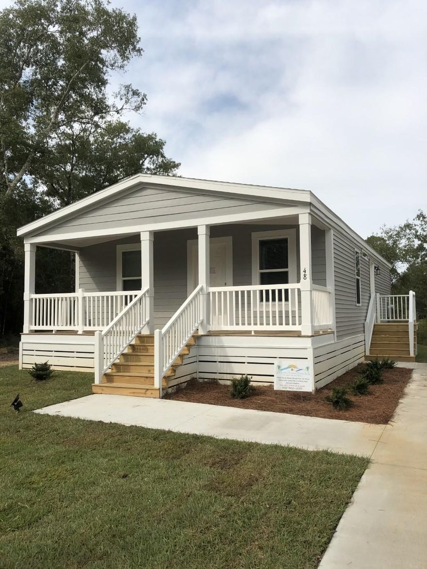 Offering $2,500 Towards Buyer's Closing Costs - Introducing Enclave, Freeport's newest community!! Adorable 3 bed/2 ba Callaway II - Palm Harbor Modular Home (2020). Ready to Move in!! Check out Virtual Tour!! Enjoy your morning coffee sitting on the covered front porch taking in the quietness of this serene community. This home welcomes you with open concept living for entertaining, generous kitchen and dining room areas along with sizeable bedrooms. You will love the spacious kitchen with all black whirlpool appliances, raised panel cabinets and tile back splash! The master bedroom has a large walk-in closet and master bath w/large fiberglass shower and raised panel cabinets with tile back splash. Full size laundry room. Built to Wind zone II Construction, 25 yr Algae Resistant Shingles,