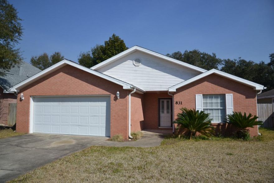 LOCATION! All BRICK, 3 bedroom, 2 bath, 1,900+ sq.ft. home is located within 10 minutes to the BEACH! Plus, the owner is offering a 1 Year, American Home Shield, HOME WARRANTY! At list price, the owner will pay most of your CLOSING COSTS; making this home easy to buy! Kitchen is equipped with Stainless Steel Kenmore Appliances, plenty of Cabinet Space, & Breakfast Bar. The Formal Dining Room is located off the Kitchen & has a vaulted ceiling. Enjoy the large Living Room with a Corner Gas Fireplace, Vaulted Ceiling, and access to the Back Porch & Open Patio. The Master Suite has a large 13x5 Walk-in Closet, tiled Master Bath w/a jetted Garden Tub, and Separate Shower. The 2 additional rooms share the tiled 2nd Bathroom.