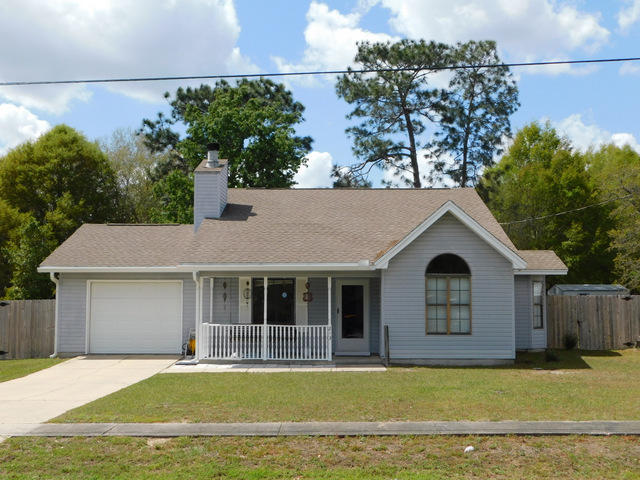 This is a great Investment or starter home! It is well cared for, in a great location on the south side of Crestview and priced to sell. The Entire heating and cooling system was replaced less than 2 years ago and came with a 10 year warranty program. The dimensional shingles were replaced in 2010, they have mostly plank wood tiled floors. The bedroom carpets were replaced in 2017, All major kitchen appliances convey with the sale. The sellers are even offering the new owners a one year home warranty through American home shield. The back yard is very large, level and has privacy wood fencing. This is a great home on a quiet street. There is a country porch out front for relaxing and a patio out back. Come and look at this low maintenance home at a great price & lower property taxes.