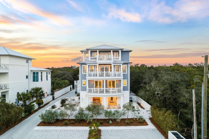 Welcome to 'Latitudes and Attitudes' at 220 W. Park Place Avenue, a magnificent dual-residence estate in Inlet Beach, perfectly positioned just steps away from the shimmering white sands and vivid blue waters of the Gulf of Mexico. This premier property boasts breathtaking unobstructed Gulf views and is conveniently close to the lively Rosemary Beach. Constructed with solid concrete block on the first floor, the robust main house spans 4,747 sq. ft and includes an elevator for easy navigation to all levels. It features seven luxuriously appointed bedrooms, including a massive bunk room/game room complete with a double bathroom setup of two sinks, two water closets/toilets, a shower/tub, plus a small bunk room, along with a conveniently located hallway washer/dryer. Perched on the fourth floor, the primary master suite is a true retreat offering unmatched privacy and panoramic views. This expansive space features large walk-in closets, a built-in wet bar, and private balconies that capture forever views of the Gulf. The spa-like master bathroom includes a garden-style soaking tub, an oversized walk-in shower, and elegant finishes throughoutmaking it the ultimate sanctuary for relaxation.

On the third floor, the home's primary living spaces serve as the hub for gatherings, featuring a state-of-the-art gourmet kitchen with two refrigerators, two ovens, two dishwashers, and two sinks, all centered around a full slab quartz island. Adjacent to this is a dining area perfect for large family meals and a cozy living room with plush seating, a Tabby fireplace with a pecky cypress mantle, and a large TV paired with a Sonos soundbar for ultimate comfort and entertainment. This level also includes a buffet counter ideal for large holiday gatherings, a large walk-in pantry, a small workspace next to the fireplace, a reading nook, a handicap-accessible bedroom and bathroom (not ADA approved), an additional washer/dryer, and a half bathroom or powder room.

The secondary home on the property, almost twice the size of a typical carriage house, offers additional luxurious accommodations and privacy. It spans approximately 1,554 sq. ft., features a two-car garage, and includes one bedroom, one bathroom, an office, and a den area with a refrigerator and sink on the first floor, and two bedrooms, two bathrooms, a living area, and a fully equipped kitchen on the second floor. Highlights include a wine refrigerator, a private enclosed patio with a dining table perfect for watching sunsets, and an open sundeck with stunning Gulf views. This home also boasts an outdoor private hot/cold shower and a serene oasis with table and chairs.

Outdoor living spaces are impressively equipped with a four-car garage, two of which are attached to the main house and two to the secondary home, providing ample storage and parking facilities. The 50-foot saltwater lap pool features a tanning shelf and water features, surrounded by a firepit, an outdoor kitchen with a sink, refrigerator, and ice machine, plus two hot/cold outdoor showers and a half-bath. The entire property is safeguarded by a fire suppression sprinkler system, and each master suite includes workstations and safes, alongside many storage lockout closets for personal items or rental supplies. Three private decks attached to bedrooms, two oversized decks, and 180-degree unobstructed views, and the stunning dunes of the Florida Panhandle enhance the charm of this estate. The coral reef directly off the beach provides a unique natural attraction, with a handicap beach entrance and beach bonfires permitted. Every deck has water sources, and outdoor outlets are available on every side of the house.

Just around the corner, the 30Avenue shopping and dining area offers a vibrant selection of boutiques and eateries. "Latitudes and Attitudes" at 220 W. Park Place Avenue is not just a homeit's a lifestyle choice for those seeking the best in beachfront living, combining modern luxuries with the natural beauty of Inlet Beach. It's a serene retreat that offers quick access to the upscale communities of Alys, Seacrest, and Rosemary Beach, ensuring every convenience is just moments away. Moreover, the nearby Grouper Reef, part of South Walton's snorkel reefs, offers an underwater habitat for marine enthusiasts, providing a unique natural attraction to this already impressive property.