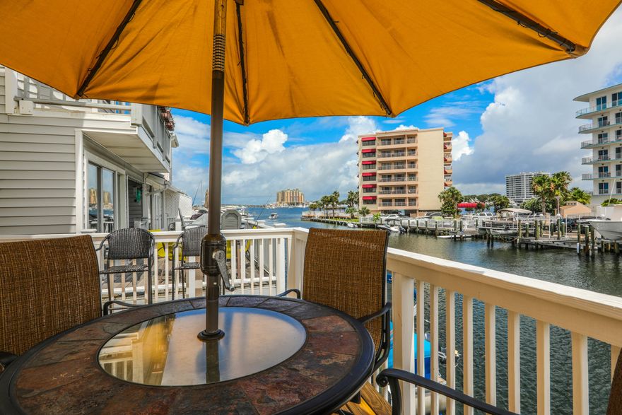 No HOA & Assumable flood insurance that's' only $660 a year! CANAL FRONT Townhome with plenty of upgrades. Located on Holiday Isle this townhome is located in the heart of Destin. You will be close to all that Destin has to offer. There are views of the Destin Harbor from all 3 patios. This townhome is close to the Gulf of Mexico, Harborwalk Village, and Crab Island. This townhome features a large waterfront patio, an additional patio on the second floor and a top floor balcony. The downstairs patio is the perfect area to hang out after a day on the water or to enjoy a cookout with friends. Attached to the bottom floor patio is a small apartment that is perfect for an additional room for guests or can serve as a recreational room.