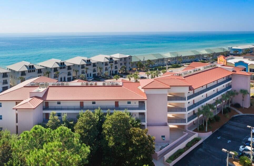 Enjoy this Emerald Waters GROUND FLOOR, fully furnished, 2 BR 2BTH extra spacious condominium just steps away from the sugar white sands of the Miramar Emerald Gulf Coast. Situated on Scenic Gulf Dr. across is your Deeded Beach Access yards from your covered patio overlooking the pool, gazebo, manicured lawns and palm trees. Parking is conveniently located a few feet from the front door for easy coming and going. Tasteful beach decor includes new wood tile flooring, furnishings, color schemes and artwork. Large bathrooms includes garden tub, double vanity and plenty of counter space. Several restaraunts, stores, shops and beaches are just a short walk or bikeride away. Turnkey and rental ready!! Owner's closet contents are reserved.