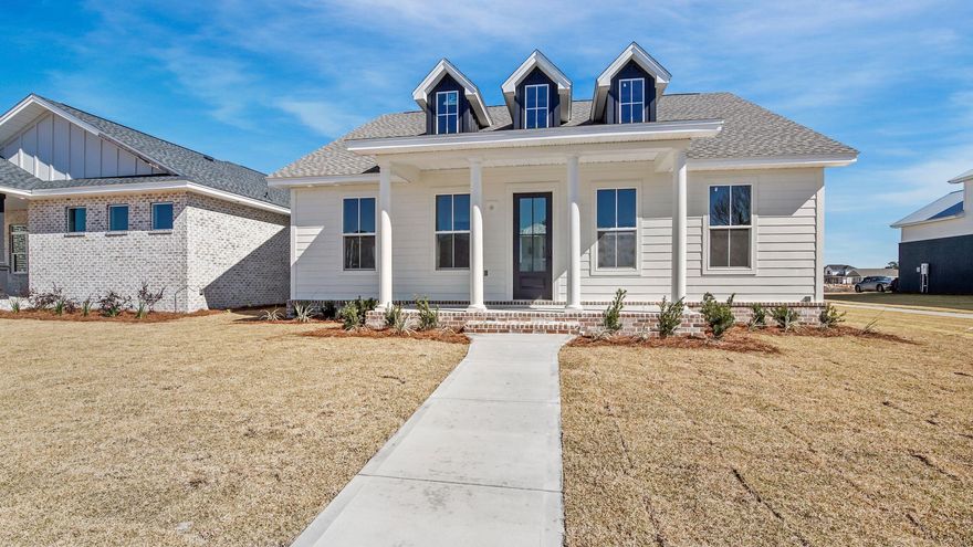 Beautiful 3br, 2ba home with Bonus room, in the quiet community of Tapestry Park! Enter through the front door into the open floor plan, The large, open kitchen, with ample counter space, Custom cabinets, Upgraded Lighting, Quartz counter tips, upgraded fixtures & Stainless Steel Appliance package. This home sits on a lot that faces the park. The home and park are both under construction. This golf cart community offers wonderful amenities including underground utilities, sidewalks, fabulous clubhouse, community pool, tennis and basketball courts, parks and green spaces, and low HOA fees that include cable, internet, and twice a week trash pick-up. Enjoy sunsets on the front porch of your charming home or take a short golf cart ride down to the beach! It's just that close!!