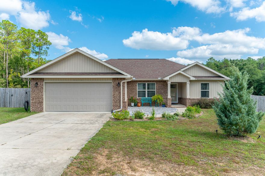 Quality build from Parade of Homes builder Linc Grant Construction with thoughtful upgrades, and just 10 minutes from downtown Crestview!  This 4-bedroom home offers comfort and charm inside and out! Enjoy an open-concept kitchen and living area featuring granite counters, shaker-style cabinets, easy-care vinyl plank flooring, with tile in baths & laundry, completed with cozy carpeted bedrooms. The primary suite features a walk-in closet, separate shower & relaxing garden tub. Added in the last year is a stunning sunroom with vinyl windows that open to let the breeze in, or closed to enjoy backyard views year-round. Step out to a covered porch ideal for grilling, or unwind in the sun on the cobblestone patio complete with garden beds, and surrounded by beautiful landscaping!