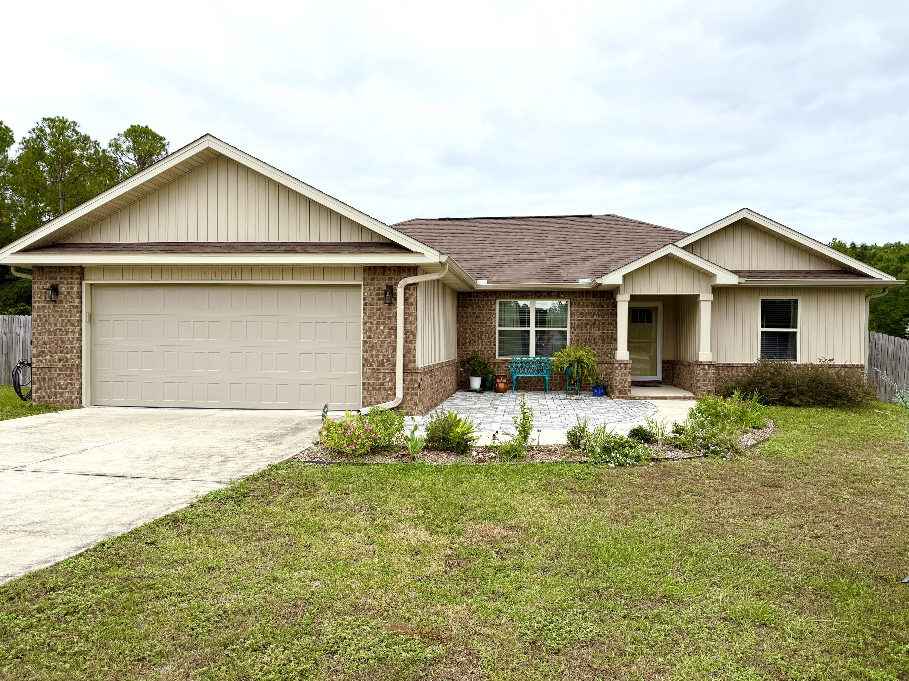 Quality build from Parade of Homes builder Linc Grant Construction with thoughtful upgrades, and just 10 minutes from downtown Crestview! This 4-bedroom home offers comfort and charm inside and out! Enjoy an open-concept kitchen and living area featuring granite counters, shaker-style cabinets, easy-care vinyl plank flooring, with tile in baths & laundry, completed with cozy carpeted bedrooms. The primary suite features a walk-in closet, separate shower & relaxing garden tub. Added in the last year is a stunning sunroom with vinyl windows that open to let the breeze in, or closed to enjoy backyard views year-round. Step out to a covered porch ideal for grilling, or unwind in the sun on the cobblestone patio complete with garden beds, and surrounded by beautiful landscaping!