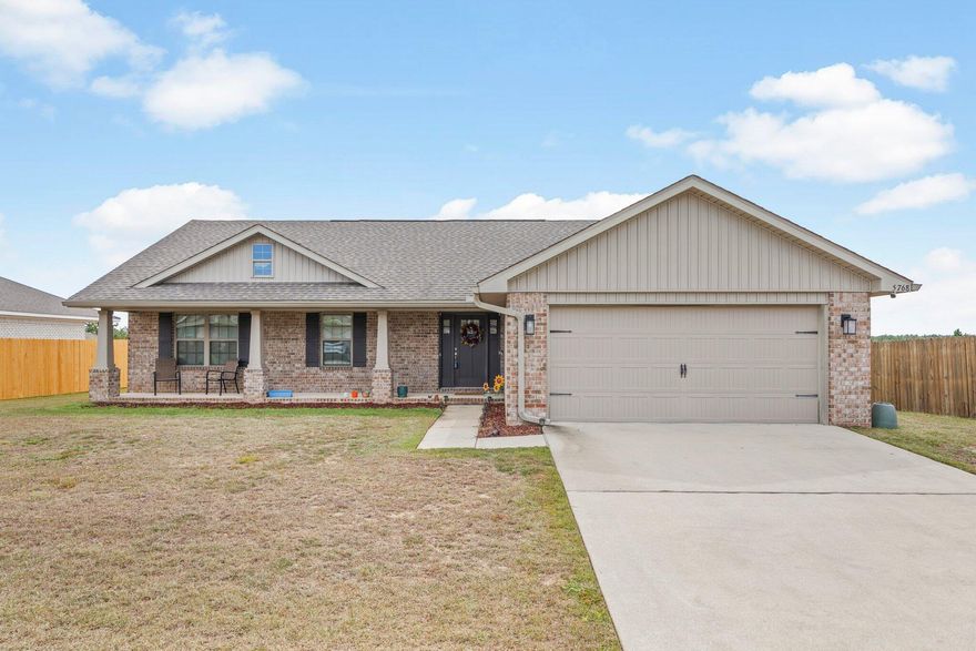 Amazing Price Improvement! Welcome home to this 4bd/2ba beauty. Greeting you as you pull into the drive is a large brick accented porch perfect for cool evenings and holiday decor. LVP floors span from the front door through the eat in kitchen and are mindfully laid in all wet areas including kitchen, bathrooms, and laundry. High ceilings and an open floor plan meet large rear facing windows to create a light and inviting space to unwind from the day. The kitchen features stainless appliances, modern cabinetry, and a breakfast bar for additional space to dine or entertain. Start and end your day in the primary bedroom that features a tray ceiling and en-suite bath. Complete with dual vanities, stand alone shower, walk in closet space, and a soaking tub, the en-suite bath was made for convenience. Continuing through this spacious home and heading out the back door you are immediately greeted by the beautiful view of the expansive wooded tree tops. The lanai offers access to the outdoors without the concern of weather and has plenty of space for furniture and entertainment. Style meets quiet comfort with this beautiful brick home.