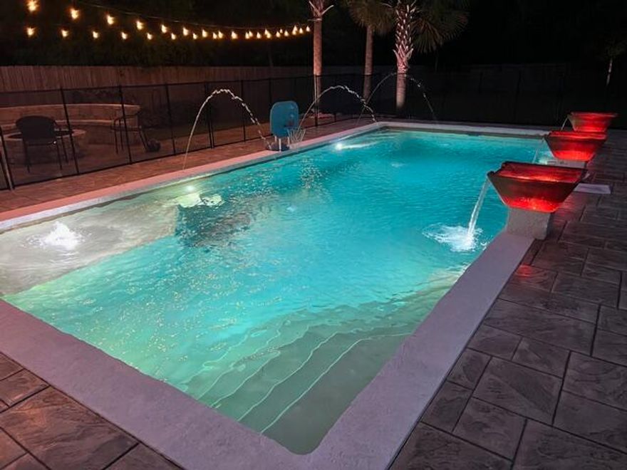 Just in time for summer fun! This spectacular residence features the amenities and quality upgrades that  buyers seek in a Florida residence!Beautiful custom pool, massive screened porch entertainment area, firepit, large lawn and beautiful landscaping make this oasis very special. With 4 bedrooms, 2 1/2 baths and nearly $180,000 dollars invested in tasteful and life enhancing upgrades this residence is truly unique. (Please review the list of upgrades in the Documents section.)  It is located in Niceville close to shopping, churches, physicians and hospitals, services and the bay, beaches and unique recreational opportunities that makes living here so special.  No HOA to deal with, and potential to build a pool house, workshop or other amenity in the deep backyard. The interior offers