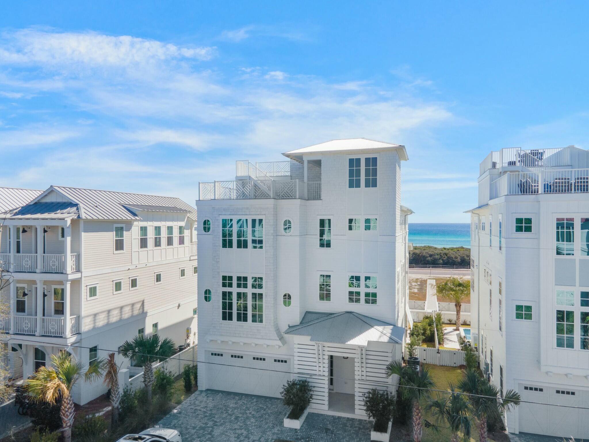 This is coastal luxury living at its finest in Inlet Beach. This custom home features breathtaking gulf views and an expansive open layout with elegant finishes and soaring ceilings bathed in natural light. The quality and attention to detail jump out at every obvious and subtle opportunity. The layout is ideal for any family or group gathering. Step outside to enjoy a private pool and a fully-equipped outdoor kitchen, perfect for seamless indoor-outdoor living. Moreover, the home offers easy access straight to the vast, soft sandy beach and emerald waters that make this destination what it is.