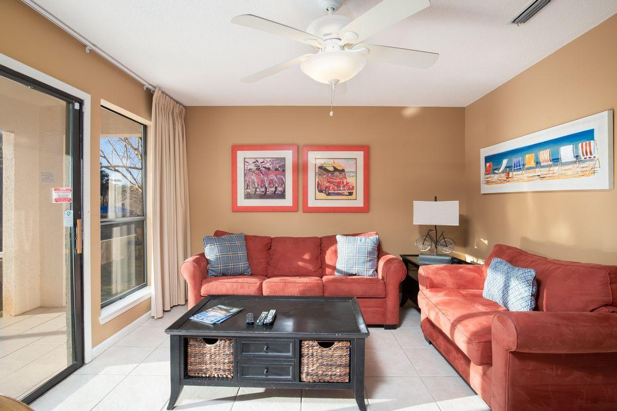 This exquisite property in the popular Tops'l Tennis Village is fully furnished and ready for enjoyment. Tennis enthusiasts will adore the location of this outstanding townhouse style condo overlooking Court 1 (center court) near the fitness center and main club house. The open floor plan allows guests to move seamlessly from the light and airy living room to the warm kitchen and generous dining room. The expansive master suite offers a private balcony and ensuite bath with dual vanities. Tops'l is a nationally renowned tennis resort with all the amenities that make it a great place to vacation and enjoy. This desirable gated community offers 600 ft. of sugar white sands, amazing fitness center, year round tram service, two restaurants on site, and much more. It doesn't get any better!