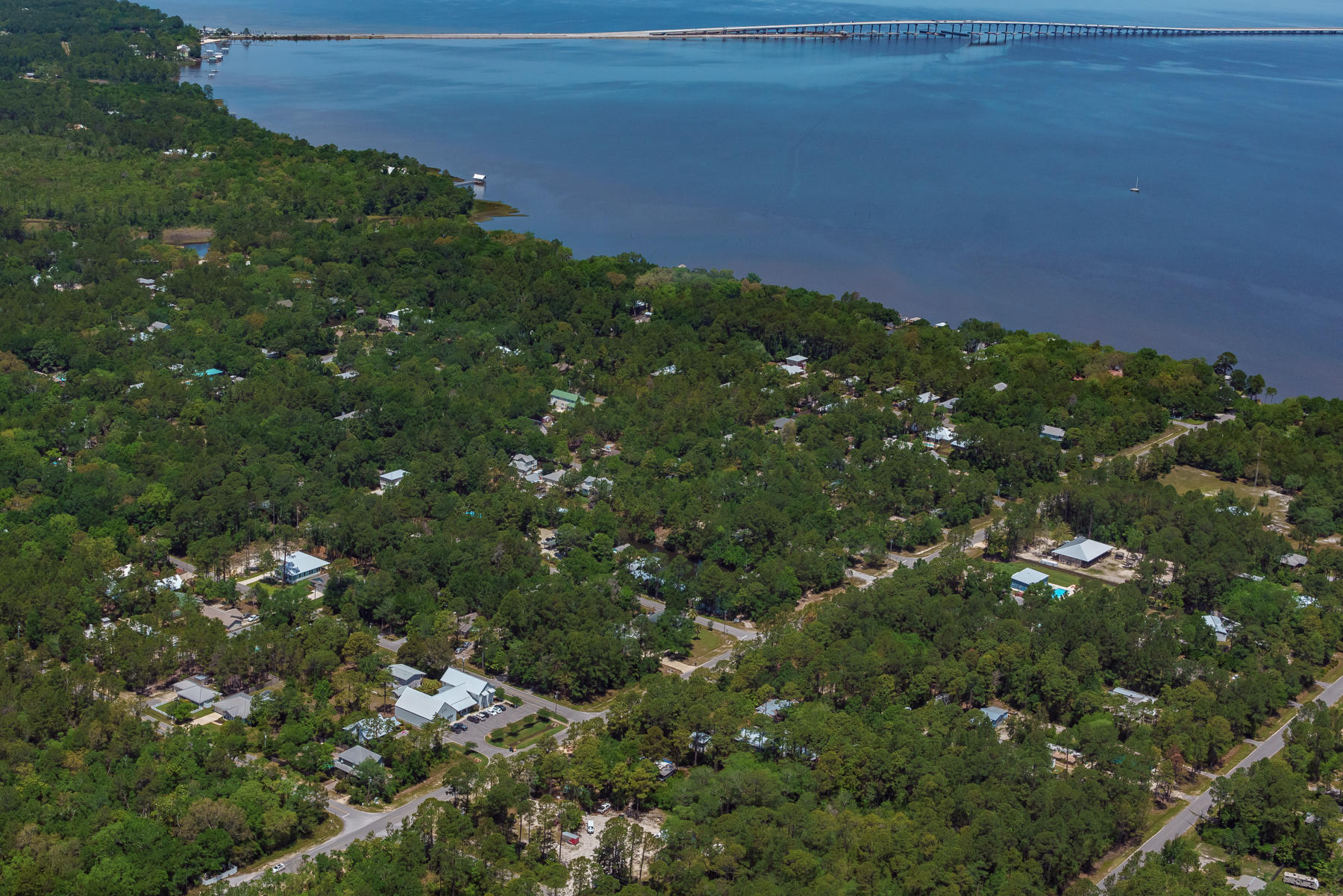 Rare opportunity for a Waterfront property! Build your dream home and dock on this 75' wide deep water canal lot leading to the Choctawhatchee Bay. Boating, fishing, yolo boarding and more can all be accessible from your own backyard. 150' of depth gives you plenty of room for an oversized home. Daughettes neighborhood is only minutes to the gulf and is a very quiet community. This lot has impressive oak, magnolia and pine trees. Perfect location to enhance your lifestyle. Covenants & Restrictions are available for review.