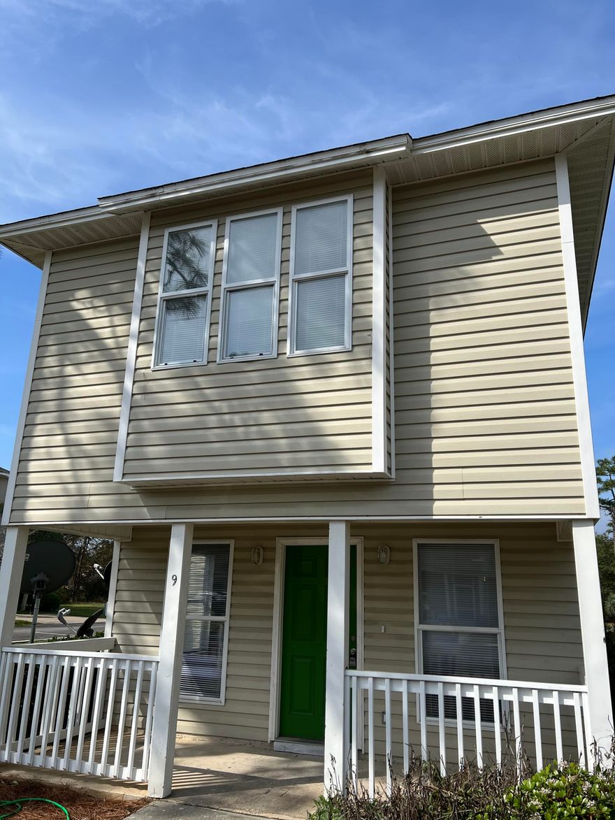 This 2 story Florida Cottage is located off of Mack Bayou road in Enchanted Estates and has a large living room and open galley style kitchen with breakfast bar. The Master Suite with walk in closet and double vanity is situated on the first floor and nicely separated from the main living area at the back of the home. The large second and third bedrooms as well as the second full bath and laundry room are on the second floor. There is a lovely covered porch off the main entrance from which to enjoy quiet evenings. This nicely maintained subdivision has a community pool and landscaped common areas. It is just minutes from the beaches, shops and activities that Destin and Santa Rosa Beach are famous for.