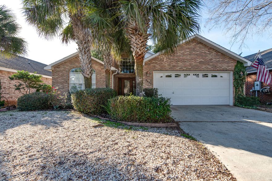 Charming all brick house nestled is located in a small waterfront community. The living room with it cathedral ceiling makes this home feel spacious. The fenced back yard feel like a secret garden. The screened in back patio is peaceful and private. Enjoy the neighborhood pool just around the corner or fishing off the neighborhood dock. Like to golf? Just across the street is a beautifully maintained golf course. Within minutes from the beach, enjoy some of the most beautiful beaches in our area.