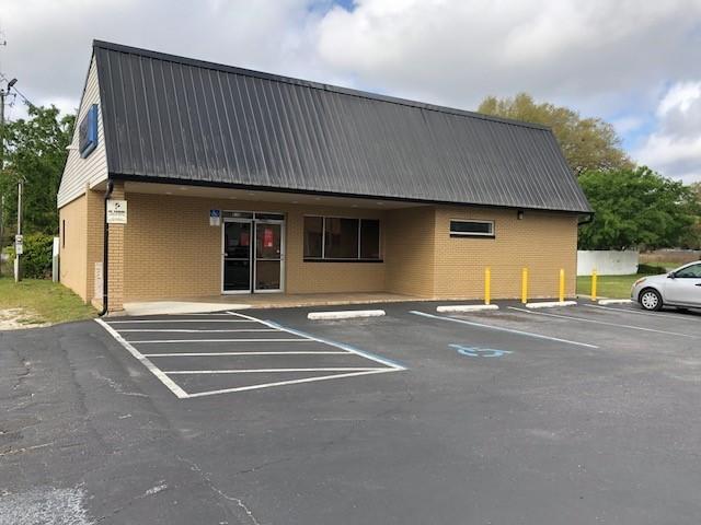 1700 SF free standing building at the corner of Hickory and Ferdon N (Hwy 85), great visibility, good for professional or retail use, formally a pharmaceutical facility