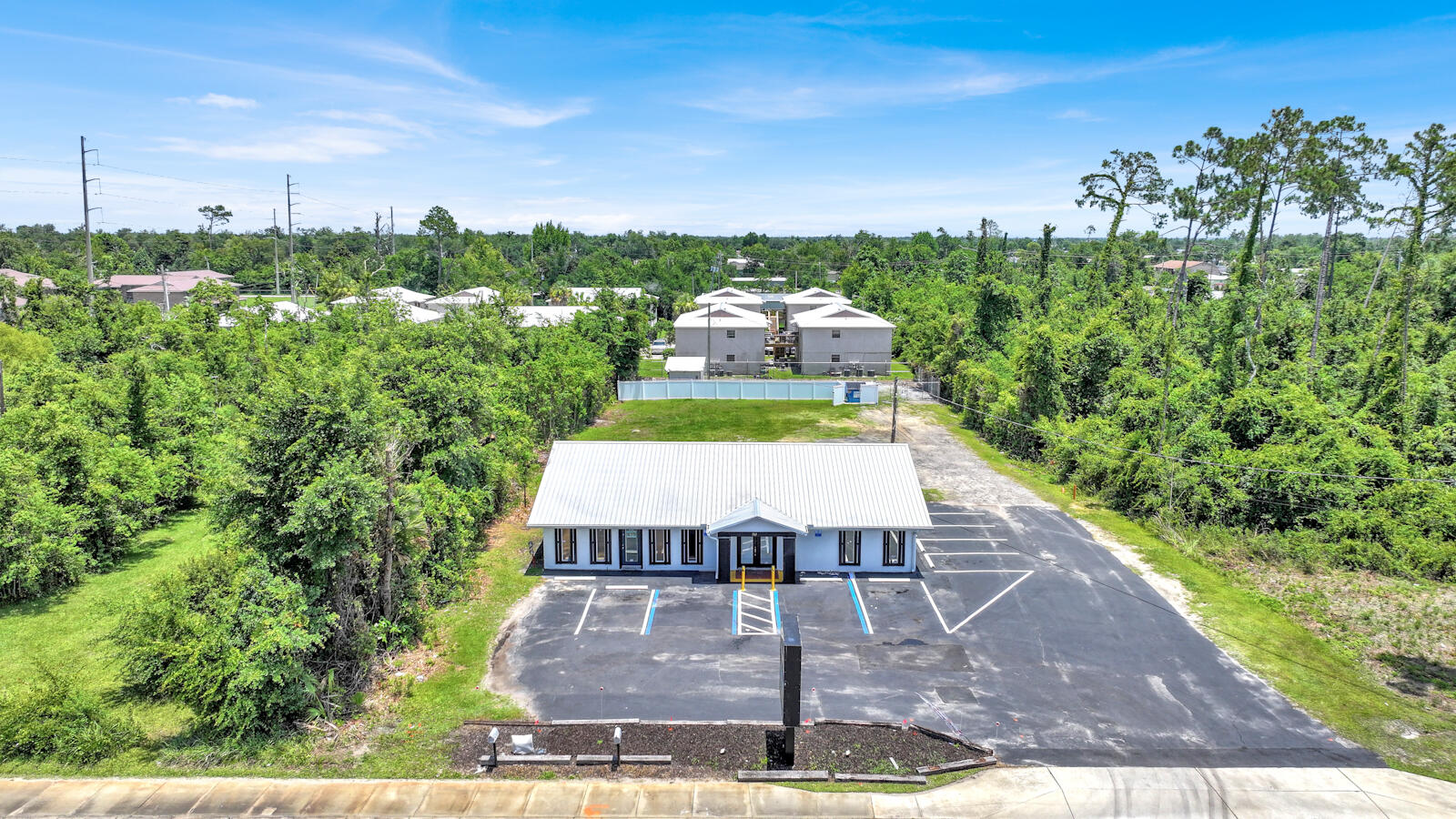 Prime Commercial Opportunity in the Heart of Callaway Located along the high-visibility corridor of S. Tyndall Parkway, this exceptional commercial property offers over half an acre of valuable real estate in one of the fastest-growing areas of Bay County. Featuring two separate commercial units with one unit 915 sq feet and other side 1325 sq feet. Currently the smaller unit is rented with immediate rental income coming in. Each unit is designed for flexible use, allowing you to operate your business from one side while generating passive income from the other or lease both for dual revenue streams. ideal for a variety of commercial uses. The property is turn-key and ready for immediate occupancy. The property is strategically located just minutes from Tyndall Air Force Base. ommercial corridor, surrounded by a mix of national retailers, local businesses, and established residential communities making it a highly desirable and convenient destination for customers.