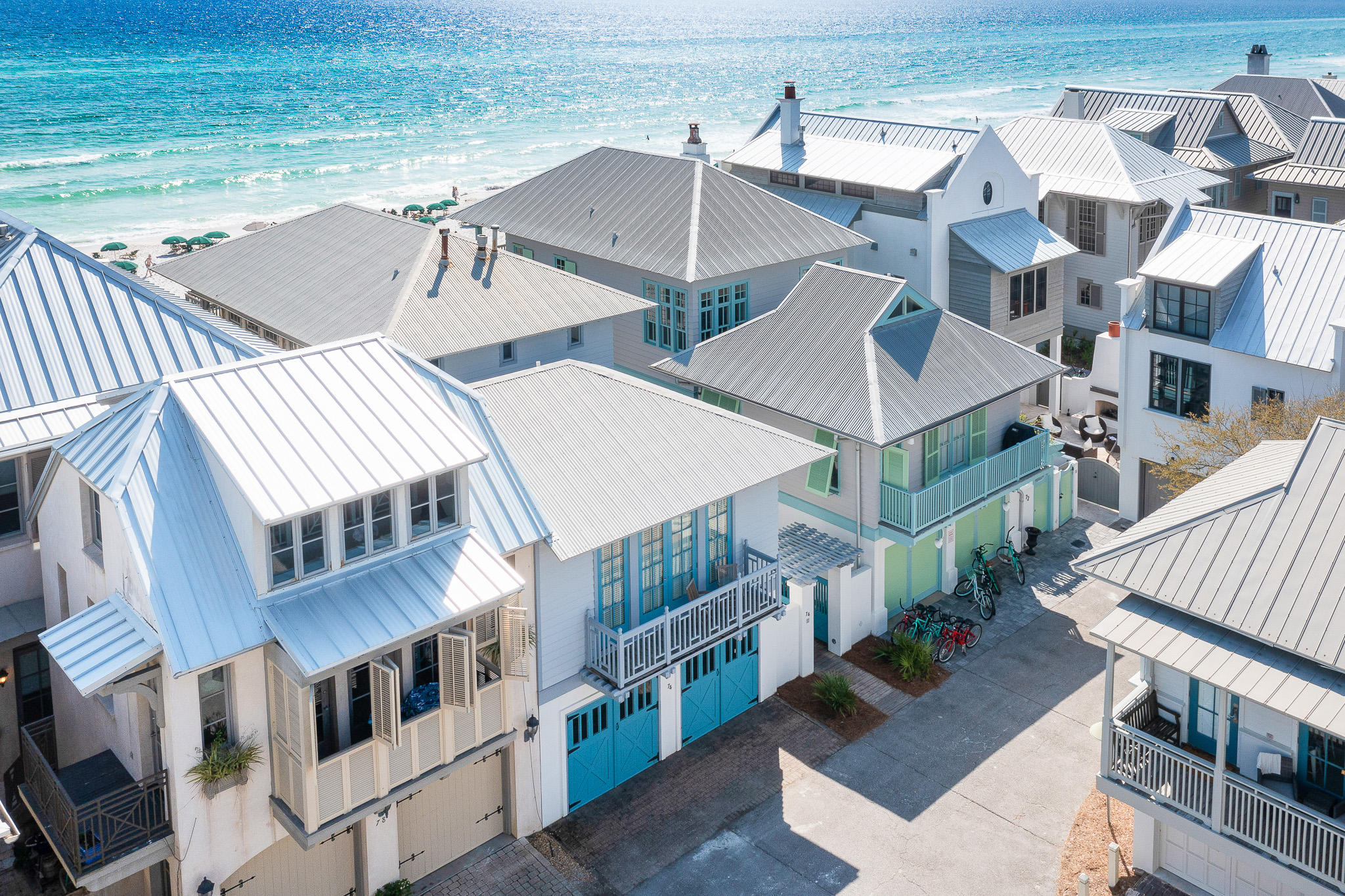 Gulf-front in Rosemary Beach!  This charming and idyllic beach house, with 2-car garage and carriage house, was designed by renowned architect Gary Justiss and built by the talented Benoit Laurent.  Still treasured by its original owner, this home has been impeccably maintained. The main house offers three bedrooms and three bathrooms and an additional bedroom and bathroom is found in the lovely carriage house which also has a comfortable living area and full-service guest house kitchen. The entrance to the residence, through the gated courtyard is warm and inviting. The home features hardwood flooring and built-in shelving throughout, making the most of the space..