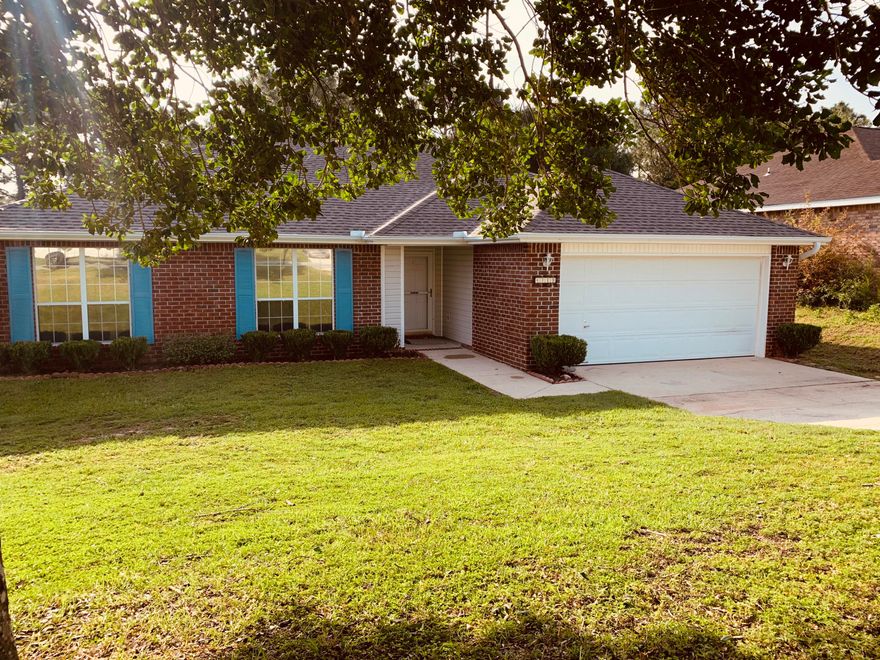 SOUTH of I-10 Beauty! This home has so many great features! It has a NEW ROOF fresh paint job, new carpet, newer AC unit and ready for its new owners! This lot is almost HALF an acre! Spend your summer nights in this large private backyard! This home features 4 bedrooms and 2 bathrooms! A great move in ready home at an AMAZING price!