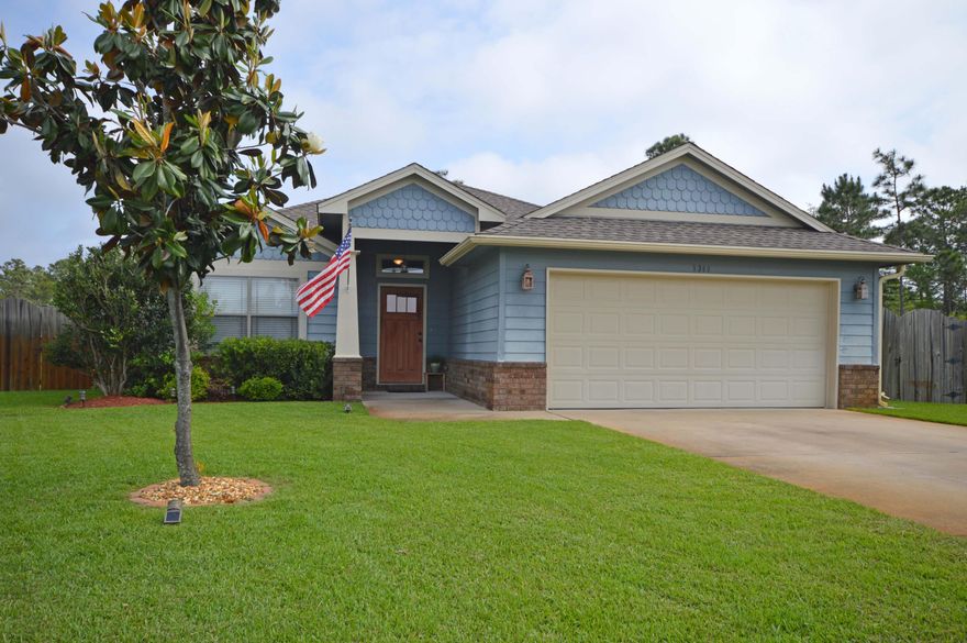 Welcome to 9300 Plano Court! Immaculate, move-in ready 3 bedroom home located in the desirable Cottages at East River subdivision. Centrally located in Navarre with quick access to Hwy 98, food, shopping, YMCA and Navarre High School. This home features an open floor plan inside, and a covered patio with a huge fenced-in backyard outside - unique in this neighborhood! Kitchen has stainless steel appliances, granite countertops, upgraded drop pendant lights and a breakfast bar. Both bathrooms have upgraded lighting and granite vanity tops. There is also a separate area for dining and an interior laundry room.