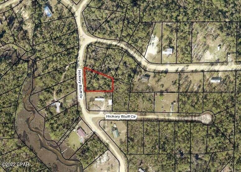 Hickory Bluff, named for the trees and high and dry land, here is a building lot, ready for a new construction or mobile home. Surrounded by new homes and a short distance to Fanning Bayou, fishing, boat ramp and just a few miles from Lynn Haven. The lot has with no association fees so bring your boat, RV, build a pole bar or workshop. Peaceful, quiet and ready to go today! Choose from any of the 50 lots we have for sale in Hickory Bluff community! Call for additional details.