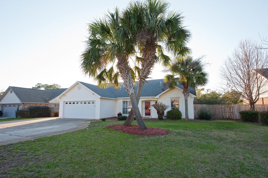 Sunny pool home with beach access & quick 5-mile commute to Hurlburt. Emerald Pointe offers residents exclusive access to Intracoastal waterway, beach & waterfront picnic area with voluntary HOA membership. Enjoy the back yard with large in-ground pool, open decks & screened porch with glimpse of the water from deck. Open floor plan offers greatroom with 2 story vaulted ceiling & fireplace, dining room with built-in shelving, split bedrooms for privacy as well as a large bonus room/loft. Kitchen has gas stove, microwave, fridge, pantry, custom cabinet shelving. Breakfast nook overlooks back yard & pool from bay window. Master bath has double vanity with solid surface counter. Tile flooring throughout except bedrooms & loft. Extra storage above garage. Extra parking on side for boat or RV.