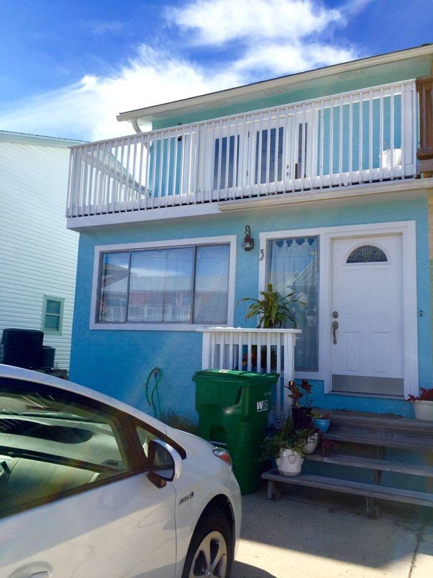 **AVAILABLE END OF APRIL**Beautiful open concept, newly renovated 2 bedroom 2.5 bathroom townhome with Gulf views on Holiday Isle, in Destin, FL. Steps away from crystal clear waters of Destin Pass and the Gulf of Mexico through private beach access. The open concept kitchen, dining and living room is located on the second flooring is perfect for entertaining with front and back decks that provide scenic outdoor living. Hard flooring throughout the second floor and titled/carpeted first floor. Spacious master suite with new spa-like master bathroom. The home includes a new wall mounted 65'' TV and washer and dryer. Boat slips with Gulf access available for rent only two blocks away. All utilities are the responsibility of renter.
