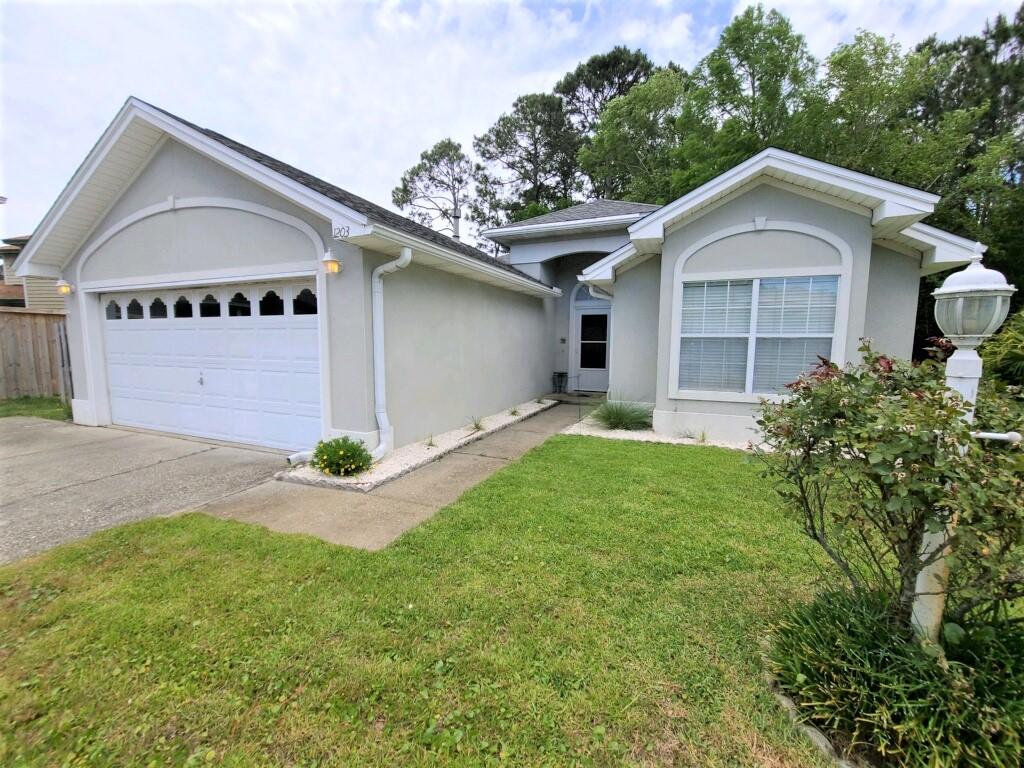 Location! Location Location! Centrally located between Hurlburt Field and Eglin Air Force Base. Home is located at the of Cul-de-Sac with expanded parking & large lot wooded back yard. Beautiful 3 bedroom/2bath with an office. Gourmet kitchen with granite countertops, stainless steel appliances with GAS stove, backsplash, breakfast bar, stainless steel double sink with upgraded faucet, recess lighting, tile floors, pantry & dining area. Spacious Living room with gas fireplace, wood floors, ceiling fan and arch entry way. Large Master bedroom has TRAY ceilings. Master bath shower with beautiful tile backsplash! Upgraded lights, faucets & skylight accents bathroom. MUST SEE PHOTOS! Sit outside on deck & enjoy backyard with a wooded area buffer. Click here for details on upgrade