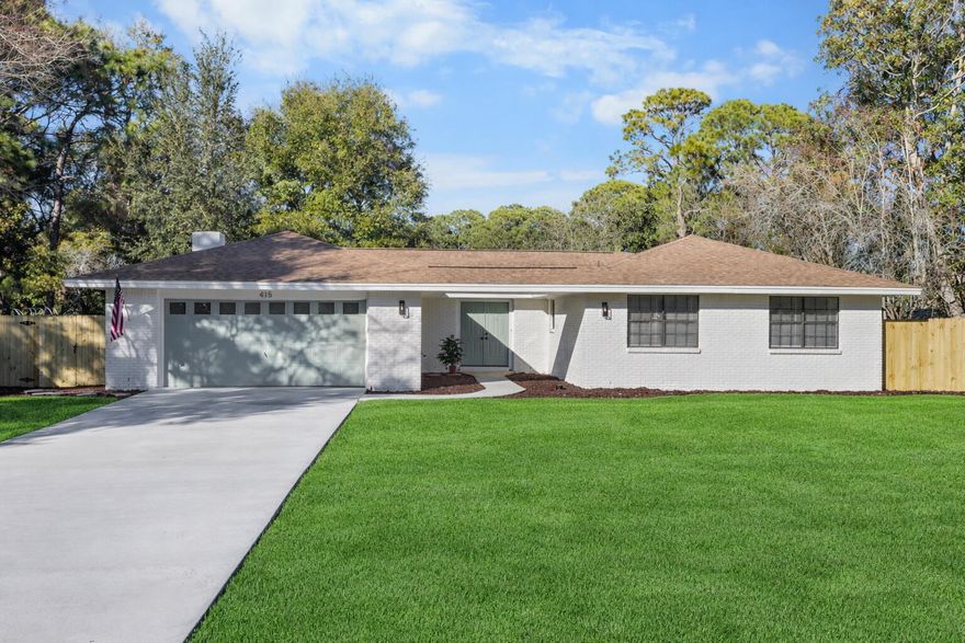 ***HOME SWEET HOME*** to this beautifully REMODELED 4 bedroom, 2 bath home located in the heart of NICEVILLE! From the moment you step inside, you'll appreciate the FRESH PAINT throughout and NEW LAMINATE FLOORS flowing through the main living areas. The STUNNING NEW KITCHEN is the heart of the home, featuring crisp White SHAKER CABINETS, GRANITE COUNTERTOPS, STAINLESS STEEL APPLIANCES, custom WOOD SHELVING, and a warm, custom MANTEL on your brick FIREPLACE  that adds charm and character. Both bathrooms have been thoughtfully updated with CUSTOM TILE SHOWERS and NEW VANITIES, giving a spa-like feel. The bedrooms offer comfort and privacy with NEW CARPET, creating the perfect retreat at the end of the day. This home blends modern updates with timeless warmth and is truly MOVE-IN READY!