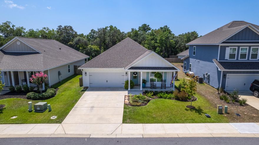 This home located in The Preserve at Paradise Cove is just beautiful! The spacious four-bedroom home features nine-foot ceilings, vinyl plank flooring throughout, granite countertops, beautiful cabinetry, recessed lighting, tray ceilings, and so much more. With a spacious master suite just off the living area and three bedrooms towards the front of the home, this desirable floor plan makes a great family home, second home, or investment property. A two-car garage provides plenty of storage, and the spacious fenced backyard backs up to a pond offering desirable privacy. The Preserve at Paradise Cove sits just outside the beautiful Point Washington State Park and is only a short drive from 30A where you can enjoy all the fantastic restaurants, shopping, and beautiful pristine beaches!