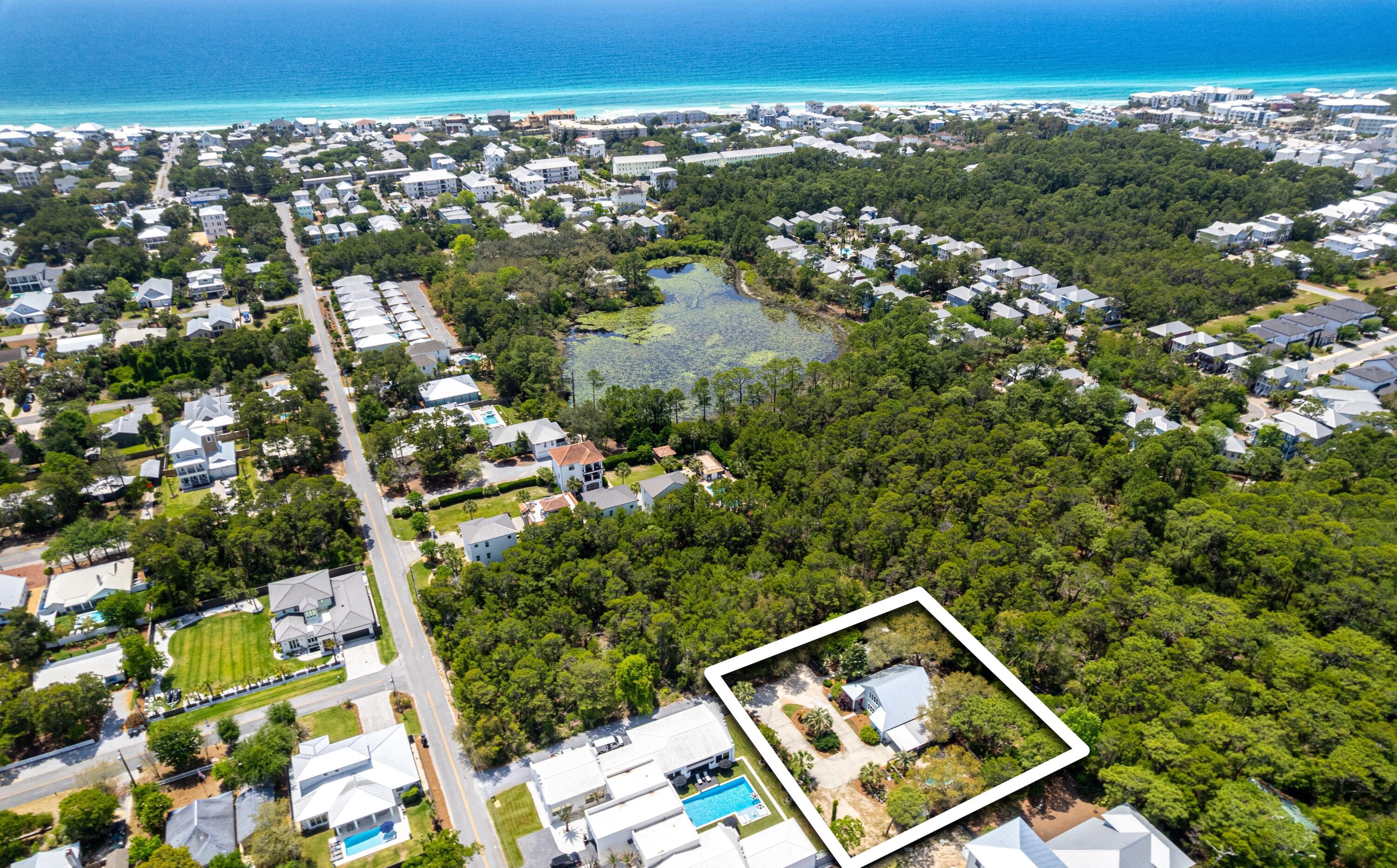 COASTAL RETREAT - 1/2 ACRE JUST OFF WEST END 30A!! NO HOA!! Just a short stroll from the beach yet privately tucked away in a serene wooded setting, this unique property offers the best of both worlds. Enjoy the tranquil ambiance of nature while being minutes from the shore. The main home offers 4 bedrooms and 3 full bathrooms and features an open-concept layout with abundant natural light and seamless indoor-outdoor flow. The very large upstairs space could easily be reconfigured to add a 5th bedroom. Step outside to your private oasis--complete with a sparkling saltwater pool, sun deck, and lush landscaping. A charming detached cottage house provides additional guest space, a home office, yoga studio, art studio, etc. The half acre lot provides plenty of room to park your RV or boat! Add a garage or pool house! Add a pickle ball, volleyball, or basketball court! In addition to the many expansion opportunities, the investment opportunities are also endless! Short term rent the whole property, or just the main house while you live in the cottage; long term rent the cottage; connect the cottage to the main house and enjoy the main house while you rent the cottage short term for a proven rental income of $60,000 per year - rental history available!! This home is extremely private and safe, surrounded by mature live oak trees, listen to the waves crashing from your screened in porch! Cool off in the pool after a day at the beach! Whether you're entertaining or unwinding, this home delivers the ultimate in comfort, privacy, and that coveted coastal lifestyle. The location is unbeatable - west end 30A is a locals delight, and the home is situated next to the Longleaf Greenway Trail head - a popular trail for birding, hiking, and mountain biking! The home is walking distance to Gulfview Heights Regional Beach Access with restrooms, pavillions with picnic tables, showers, and of course the white sandy beaches and emerald green gulf water! Also walking distance to so many eateries and shops along west end 30A, such as Goatfeather's Restaurant, Shunk Gulley, Gulf Place, Growler Garage, Local Catch, and many more! This is truly a unique opportunity, please call me for your private tour, take the plunge and start living the coastal dream today! 