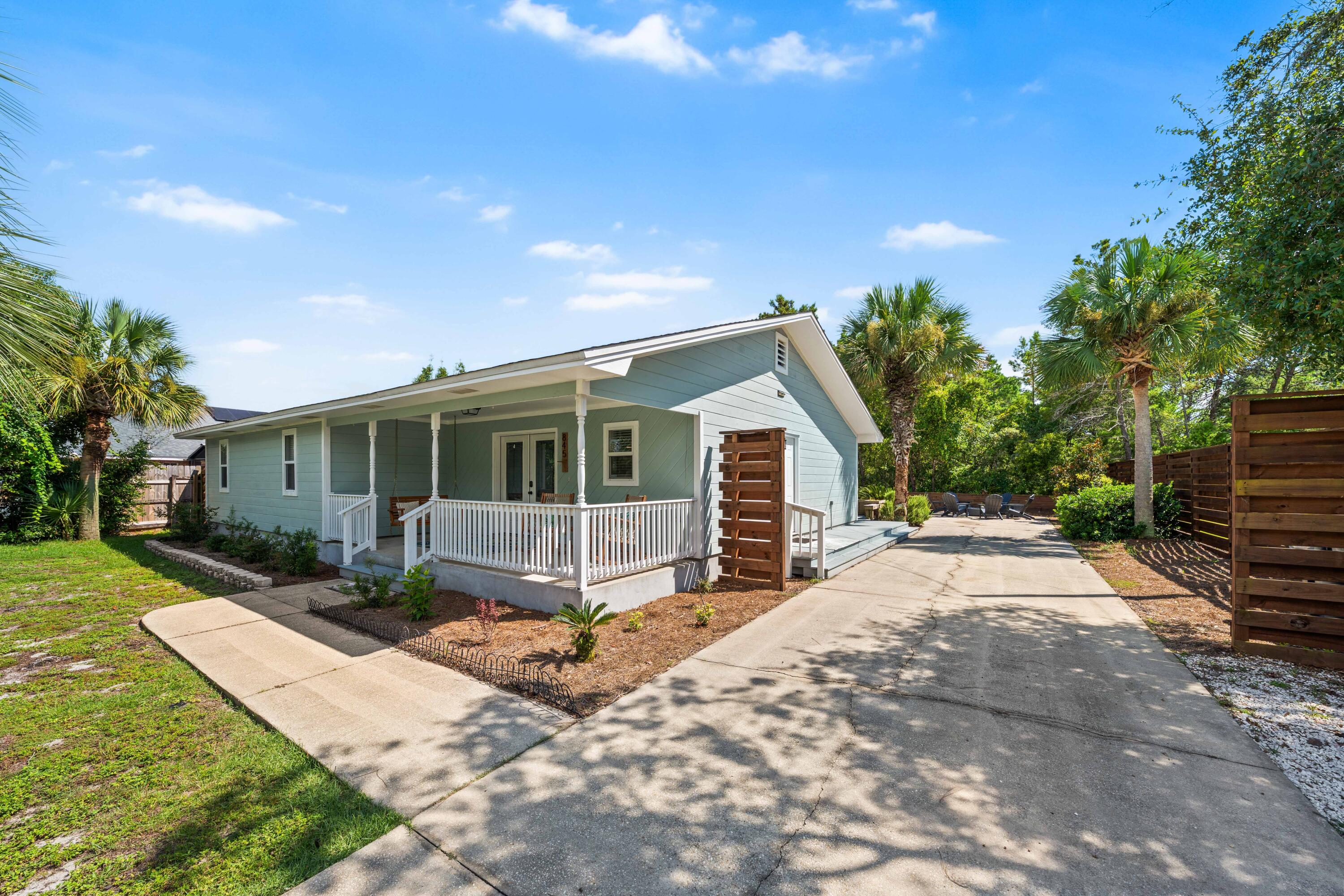 This is your chance to own a home in a prime location, whether you're looking for a primary residence, a second home, or a great rental investment. Just a block from the bay and a short stroll to the beach, this FULLY FURNISHED 4-bedroom, 2.5-bathroom home is set up for fun and relaxation from day one. Step inside to find a comfortable space with updated flooring, kitchen, and bathrooms. The oversized garage has been transformed into a fantastic game room. It's the ultimate hangout spot, fully equipped with ping pong, air hockey, foosball, and a TV area. It's a great bonus that's sure to be a hit with family and guests alike.
The large .3-acre lot provides a spacious and private feel, giving you plenty of room to enjoy the outdoors. Imagine unwinding on the covered front porch with your morning coffee or hosting a barbecue on the expansive back patio. This property offers the perfect mix of comfort and convenience in a great coastal community.