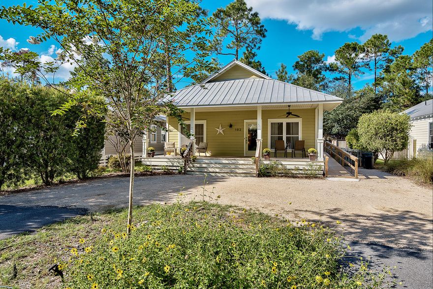 Charming Florida Cottage on a large lot in Magnolia Beach within walking distance to the Bay. Located just 5 miles North of Grayton Corner and the Beaches of S. Walton. Beautiful new bamboo floors with an extremely open floor plan. Large kitchen with oak cabinets, granite counter tops, bar seating and stainless steel appliances. Gas stove, large fireplace, wine cooler and more! 4 large bedrooms with lots of natural light. Huge Porches overlooking a wonderful back yard and 6' bamboo fence. Lot is large enough for carriage house/pool. Store your boat on your property and access the bay via the Pt. Washington Public Boat Ramp. Sold unfurnished, washer/dryer and refrigerator do not convey, but all can be negotiated All measurements should be verified by buyer.