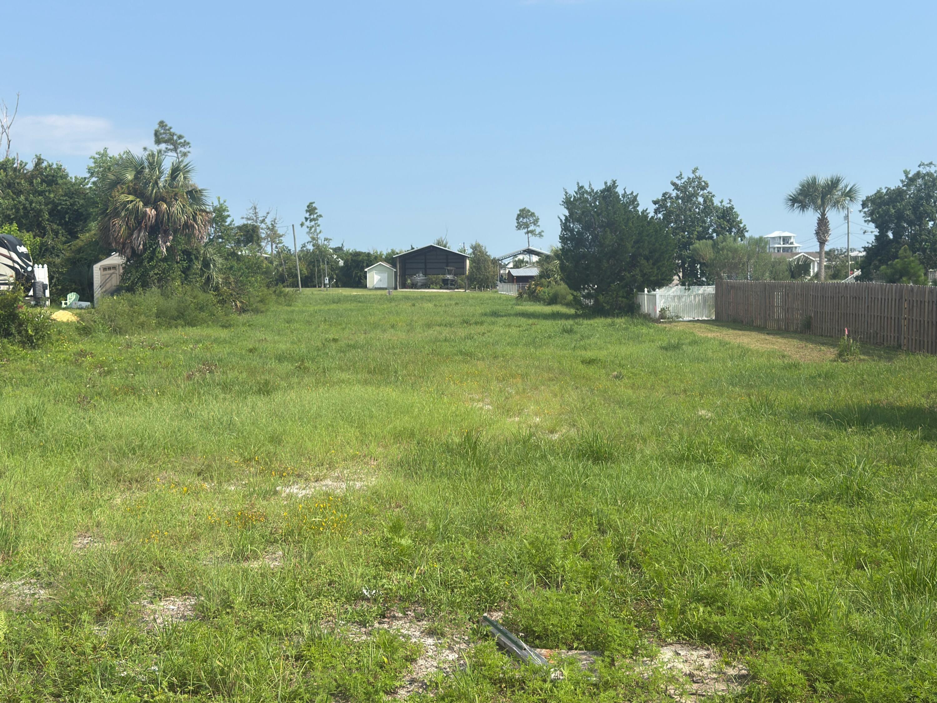 St Joe Beach 2nd block vacant lot that is cleared and only 800' from Highway 98. This 75' by 150' parcel is just over 1/4 acre so one has plenty of room for a nice beach cottage and storage for all of the beach toys. Save thousands of dollars on tree and debris removal as the X FLOOD ZONE lot will be suitable for ground floor living quarters so no annoying elevated foundation or stairs! This unique beach lot can be your jumping of point to all things beachy and Gulf County. Water, Sewer, Power, Phone/ Internet are available and adjacent to the property. Some dimensions were obtained from the Gulf County Property Appraiser's Office, please verify if important.